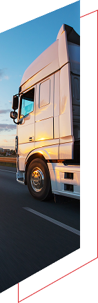 Side view of a white truck on the road