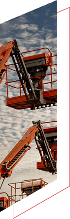Construction lift against a cloudy sky.